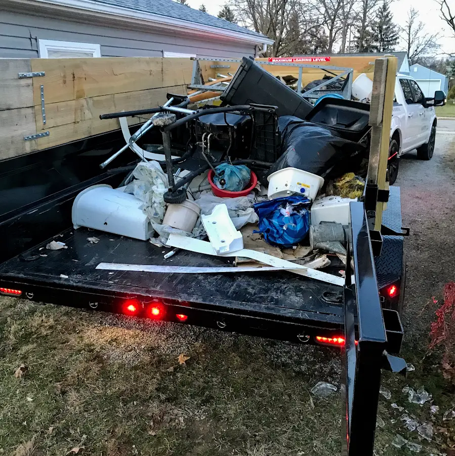 Roll-off dumpster delivered to a residential driveway in Almena